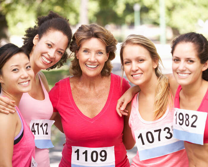 group of women who have took part in a charity run